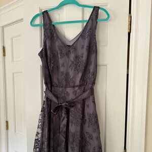 Gray sleeveless cocktail dress with lace overlay and waist tie - size 14